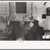 Two men eating breakfast in cafe, Granville, North Dakota