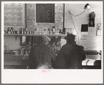 Two men eating breakfast in cafe, Granville, North Dakota