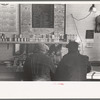 Two men eating breakfast in cafe, Granville, North Dakota