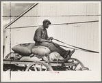 Southeast Missouri Farms. FSA (Farm Security Administration) client sitting on load of cotton seed