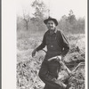 Sharecropper and plow, near Laurel, Mississippi