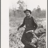 Sharecropper and plow, near Laurel, Mississippi