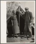 Migrant man and wife camped near Sebastian, Texas