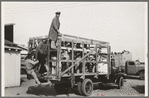 Mexican spinach cutters leaving for work in the fields, La Pryor, Texas