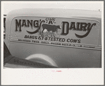 Sign on milk wagon, Crystal City, Texas