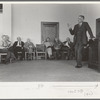 President of bank speaking to a group of San Augustine county residents at a meeting held to discuss raising of funds to continue WPA (Work Projects Administration) roadwork, San Augustine, Texas
