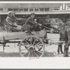 Farmer and daughter in wagon, Saturday afternoon, San Augustine, Texas
