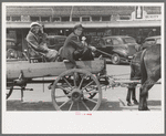 Farmer and daughter in wagon, Saturday afternoon, San Augustine, Texas