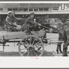Farmer and daughter in wagon, Saturday afternoon, San Augustine, Texas