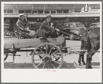 Farmer and daughter in wagon, Saturday afternoon, San Augustine, Texas