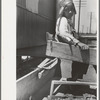 Son of Negro strawberry farmer at loading station, Hammond, Louisiana