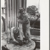 Guiding bit through rotary table, oil well, Kilgore, Texas