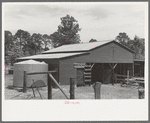Barn and water tank of FSA (Farm Security Administration) client, Sabine Farms, Marshall, Texas