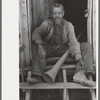 Old Negro (former slave) with horn with which slaves were called, near Marshall, Texas
