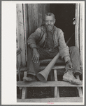 Old Negro (former slave) with horn with which slaves were called, near Marshall, Texas