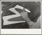 Sewing lining in piece of upper of boot. Bootmaking shop, Alpine, Texas