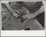 Trimming lower part of boot. Cowboy bootmaking shop, Alpine, Texas