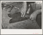 Fitting upper to lower part of boot. Bootmaking shop, Alpine, Texas
