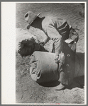Tying the bedroll. Bunk of the cowboy on the range. Cattle ranch near Marfa, Texas