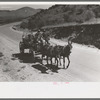 Chuck and bedroll wagon of the tank gang on the highway. Near Marfa, Texas