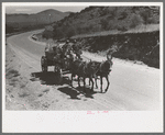 Chuck and bedroll wagon of the tank gang on the highway. Near Marfa, Texas