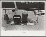 Dinner cooking over an open fire. Cattle ranch near Spur, Texas