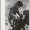 Mr. Milton, pioneer farmer at El Indio, Texas
