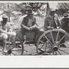 Negro FSA (Farm Security Administration) clients listening to farm supervisor at mass meeting near Marshall, Texas. Sabine Farms, Texas