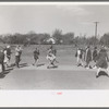Schoolchildren jumping rope, San Augustine, Texas