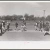 Schoolchildren jumping rope, San Augustine, Texas