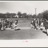 Schoolchildren jumping rope, San Augustine, Texas