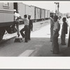 Boarding train at San Augustine, Texas