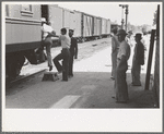 Boarding train at San Augustine, Texas