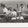 Negro family with supplies in wagon ready to leave for the farm, Saturday afternoon, San Augustine, Texas