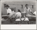 Negro family with supplies in wagon ready to leave for the farm, Saturday afternoon, San Augustine, Texas