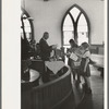 Preacher reading the lesson and instructions before baptism, San Augustine, Texas