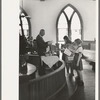 Preacher reading the lesson and instructions before baptism, San Augustine, Texas