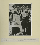 German woman with a poster saying: I was kind to the Poles, I am the worst swine in the village.