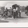 Activity around the soda pop stand at polo match, Abilene, Texas