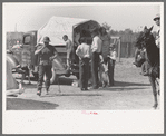 Activity around the soda pop stand at polo match, Abilene, Texas