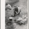 Making lunch along the roadside near Henrietta, Oklahoma. This is a migrant family en route to California