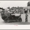 Migrant family's car stalled in main street of small town near Henrietta, Oklahoma