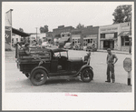 Migrant family's car stalled in main street of small town near Henrietta, Oklahoma