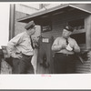 Streetcar operators talking in terminal, Oklahoma City, Oklahoma