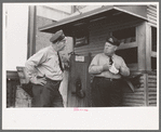 Streetcar operators talking in terminal, Oklahoma City, Oklahoma