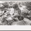 Little girl and her baby brother reading Bible, community camp, Oklahoma City, Oklahoma