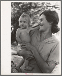 Wife of carpenter and her baby who live in community camp, Oklahoma City, Oklahoma