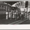 People getting off and people waiting to get on streetcar. Terminal, Oklahoma City, Oklahoma