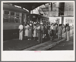 People getting off and people waiting to get on streetcar. Terminal, Oklahoma City, Oklahoma