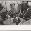 Tourists at cliff dwellings in Mesa Verde National Park, Colorado